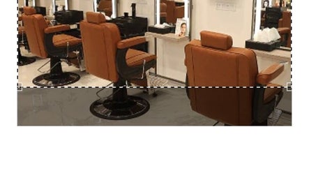 Elegant styling chairs at Revive beauty salon, Pimpri-Chinchwad, Maharashtra, IN.