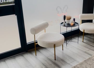 Modern seating area at Beauty&lengths by aim, Stoke-on-Trent, England, GB, showcasing stylish chairs and decor.