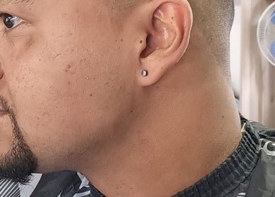 Close-up of a stylish haircut at Classic Touch Barber in Sandton, Gauteng, ZA.