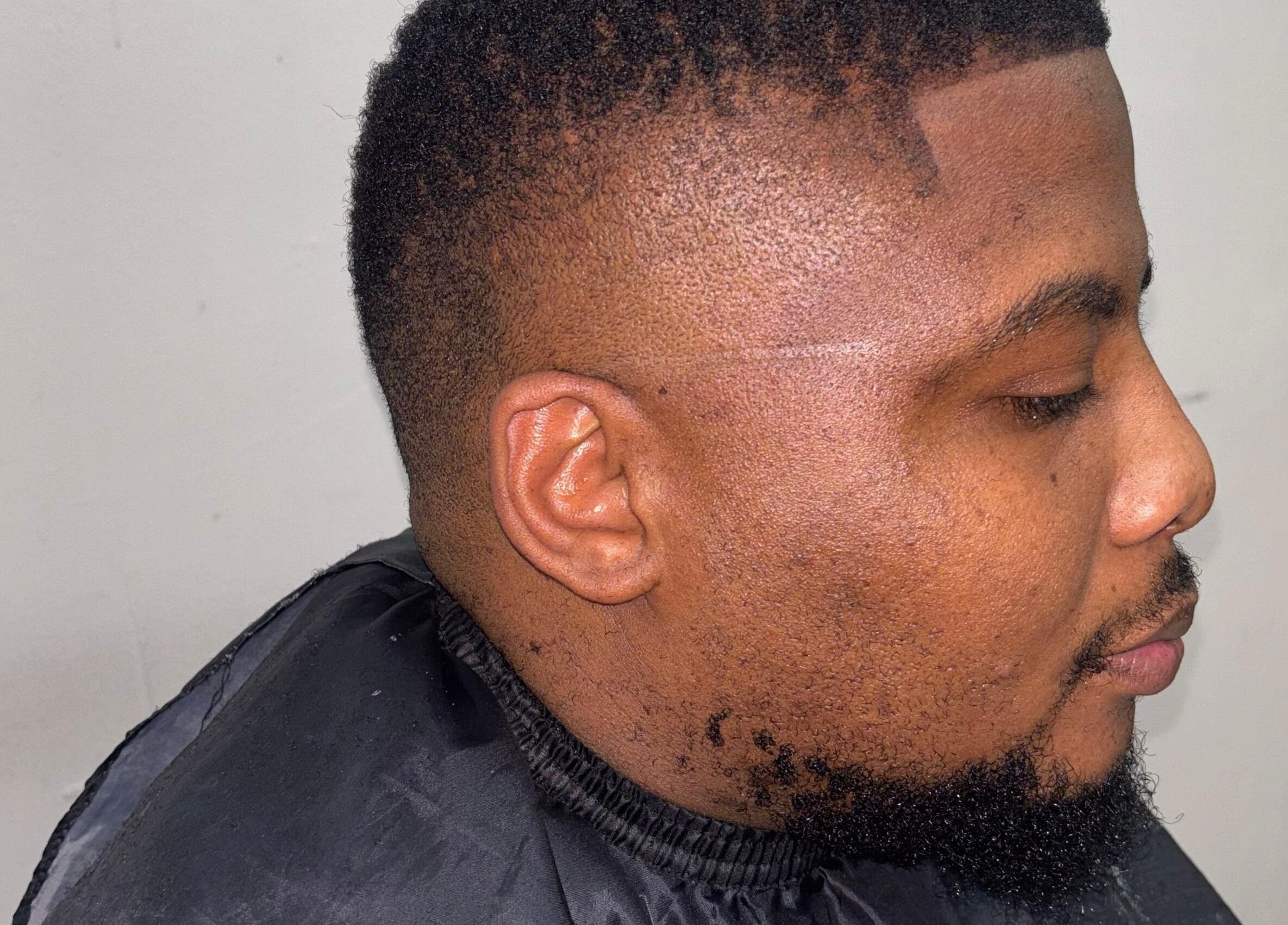 Close-up of haircut at Classic Touch Barber, Sandton, Gauteng, ZA, showcasing expert grooming.