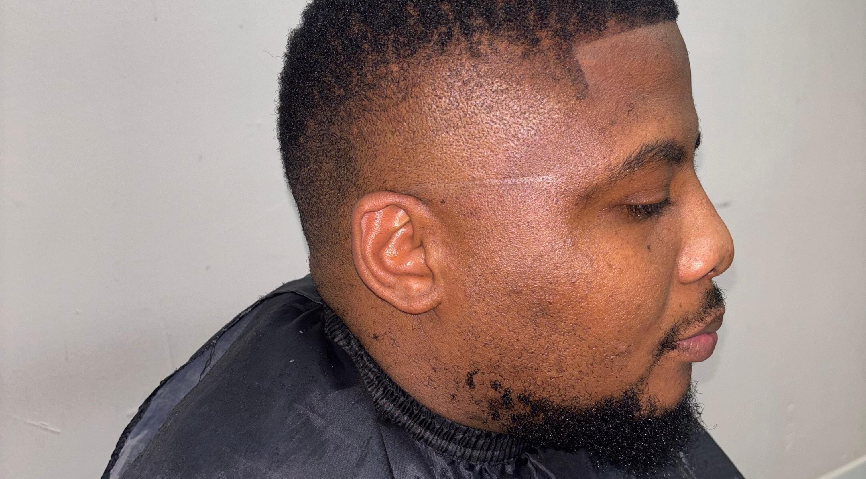Close-up of haircut at Classic Touch Barber, Sandton, Gauteng, ZA, showcasing expert grooming.