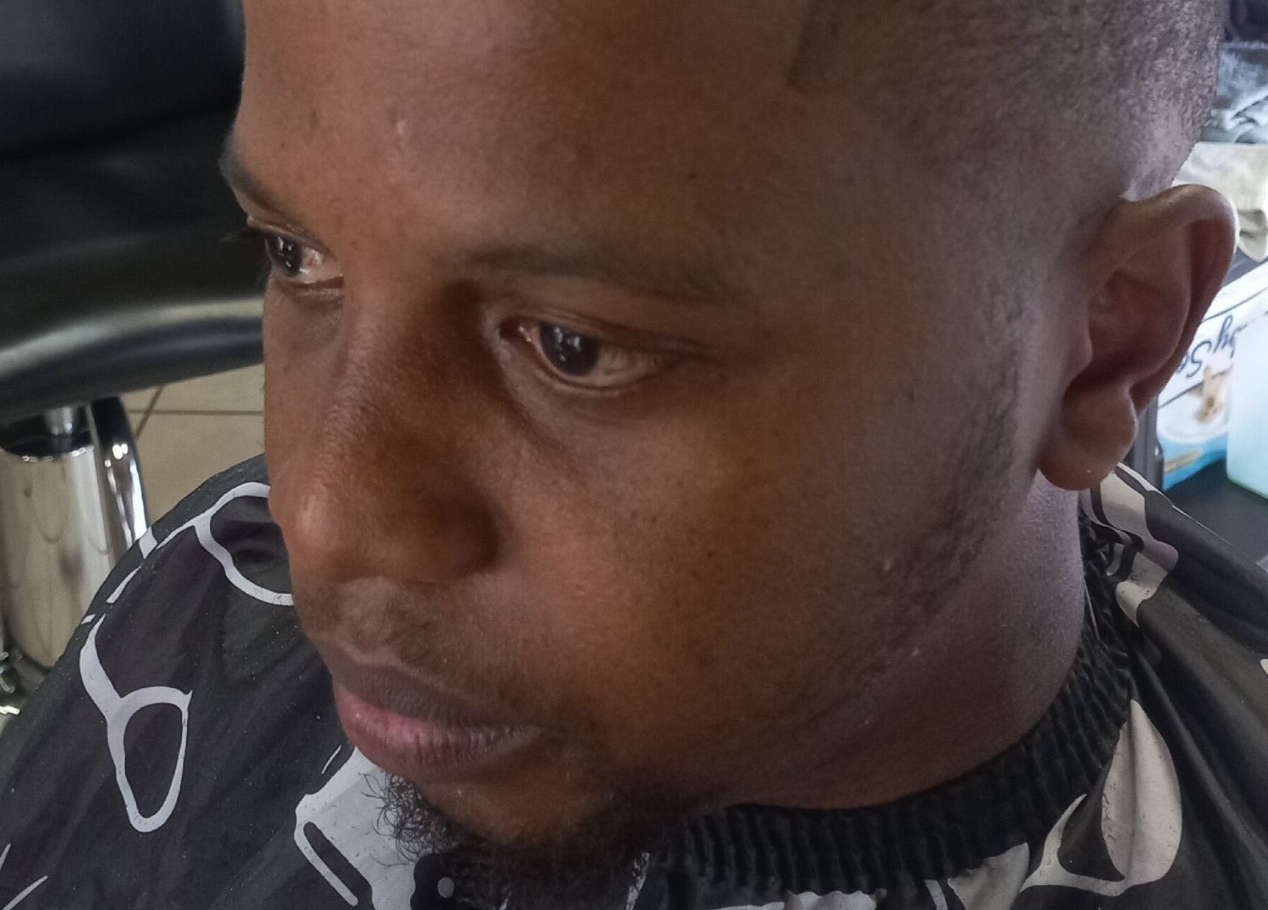 Close-up of a fresh haircut at Classic Touch Barber, Sandton, Gauteng, ZA, showcasing expert grooming.
