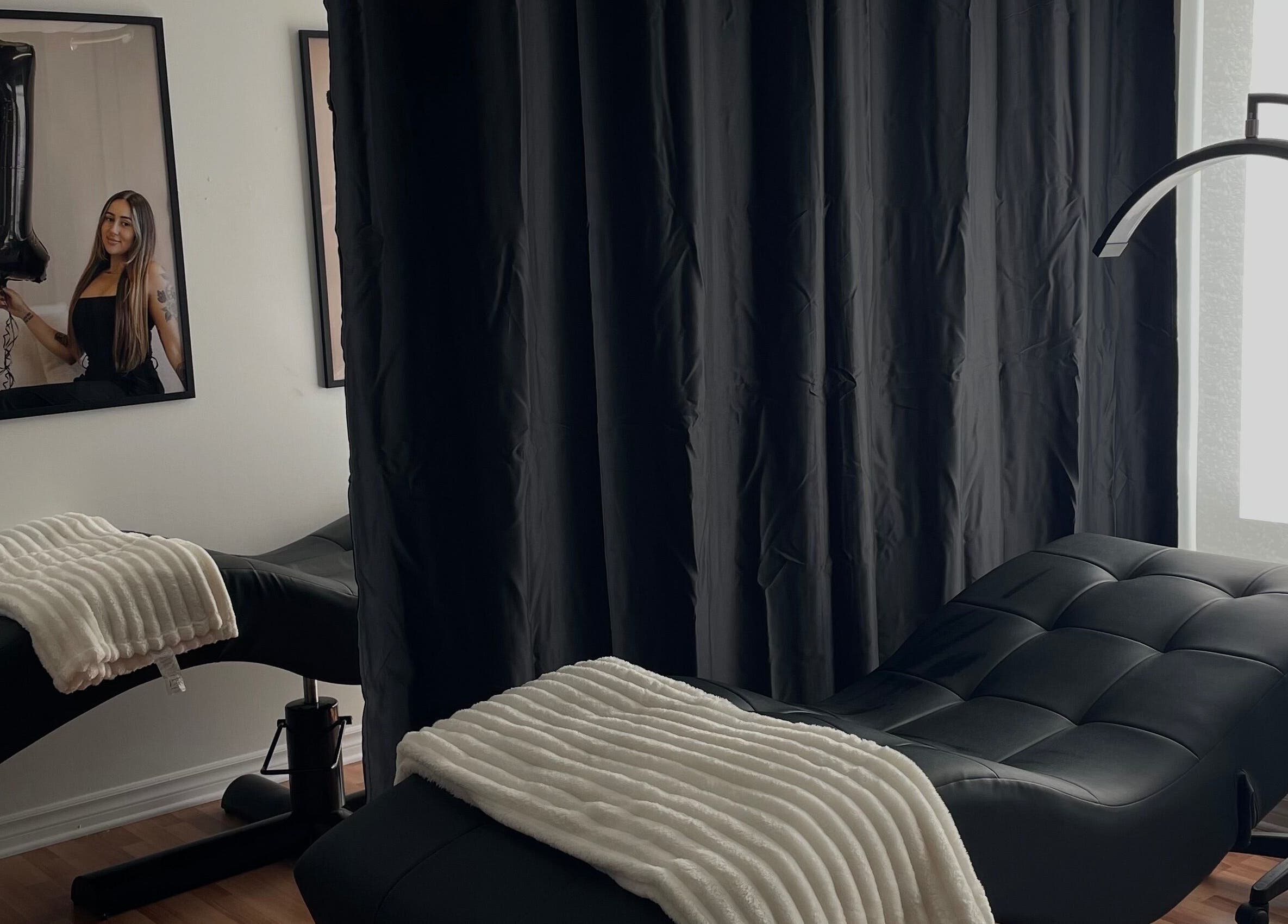 Plush treatment beds at The Wink Room, Gatineau, Québec, CA, offering relaxation and comfort.