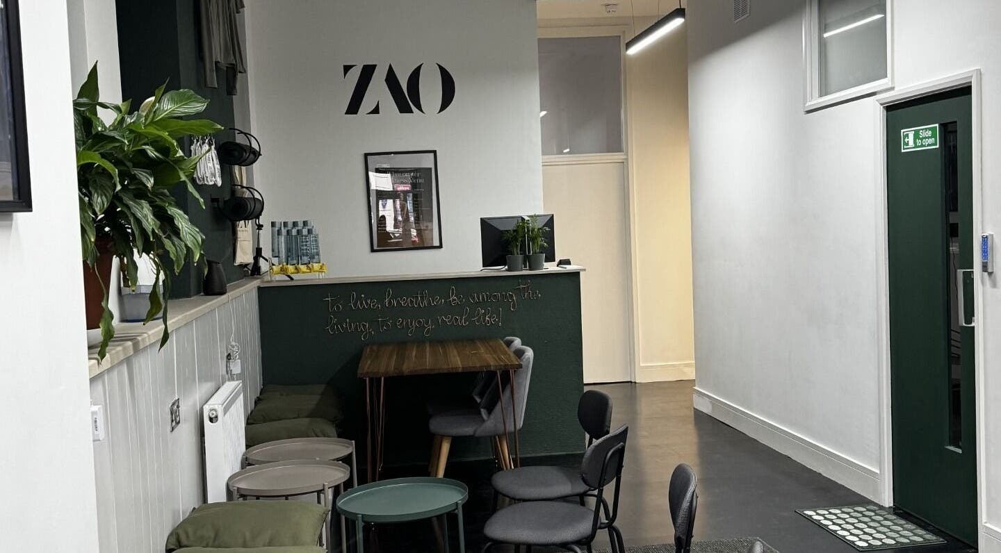 Modern lounge at Renuvenate, London, England, GB with stylish seating and a cozy atmosphere.