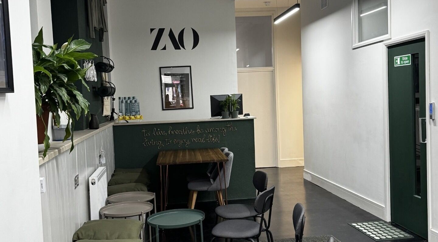 Modern lounge at Renuvenate, London, England, GB with stylish seating and a cozy atmosphere.