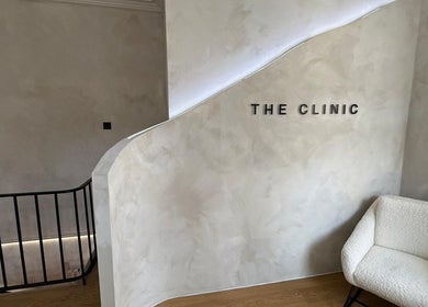 Elegant reception at Missclinicaesthetics, Bath, England, GB; cozy chair and stylish decor.