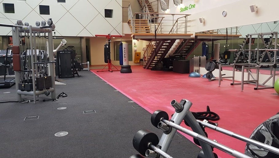 Modern gym at AB Mental & Boxing Coach, London, England, GB, featuring state-of-the-art equipment and boxing area.