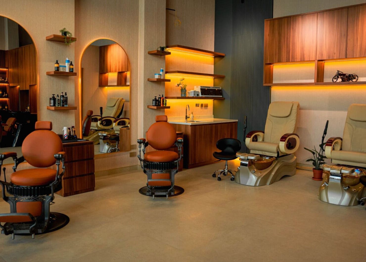 Elegant interior of Bebek Gents Salon L.L.C, Dubai, AE, featuring chic barber chairs and modern decor.
