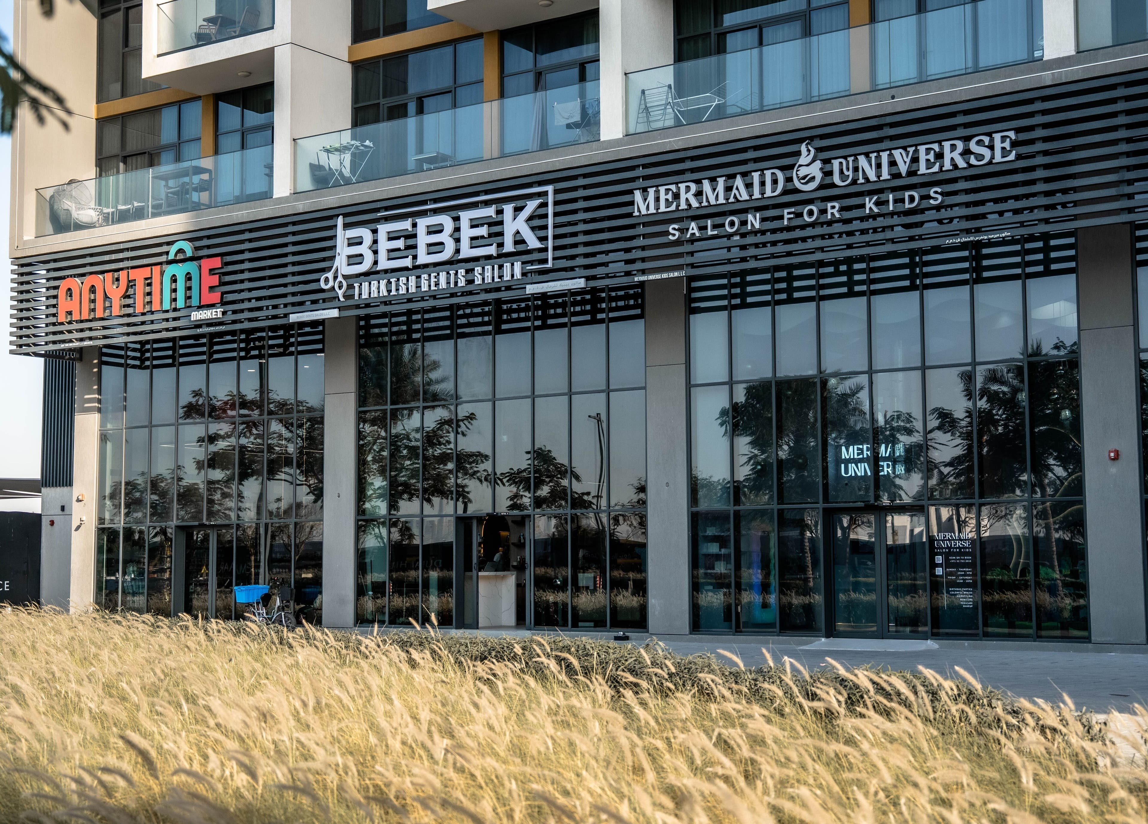 Exterior of Bebek Gents Salon L.L.C in Dubai, AE showcasing a sleek, modern facade.