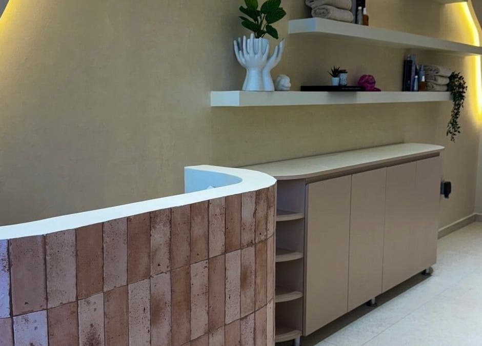 Modern reception area with unique decor at Blowhaus Beauty Studio, Dubai, AE.