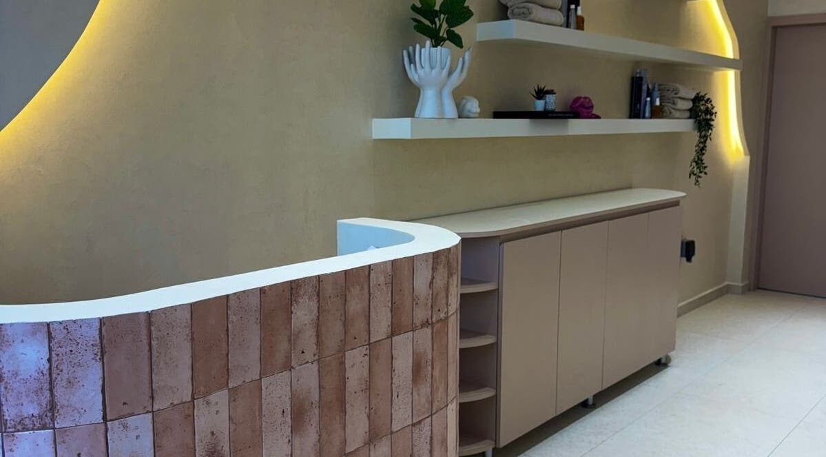 Modern reception area with unique decor at Blowhaus Beauty Studio, Dubai, AE.