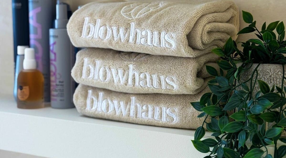 Elegant towels and products at Blowhaus Beauty Studio in Dubai, AE, showcasing comfort and quality.