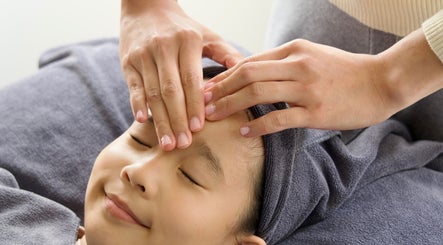 Calming facial massage at MeiC Beauty&Massage in Canterbury, England, GB enhances relaxation and wellness.