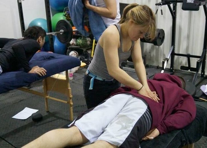 Massage therapy at Astbury Acutherapy in Congleton, England, GB. Therapist providing care in wellness space.