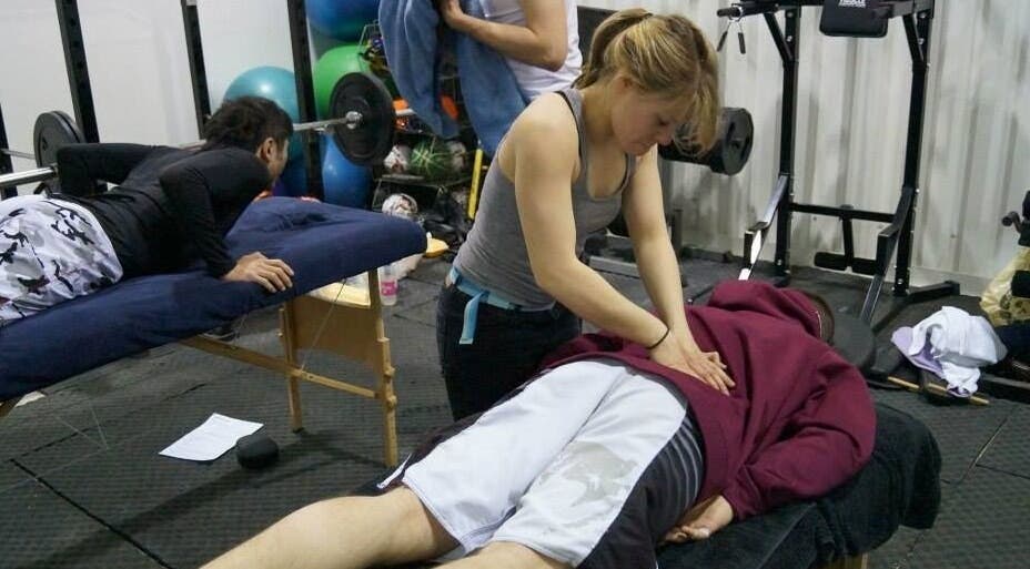 Massage therapy at Astbury Acutherapy in Congleton, England, GB. Therapist providing care in wellness space.