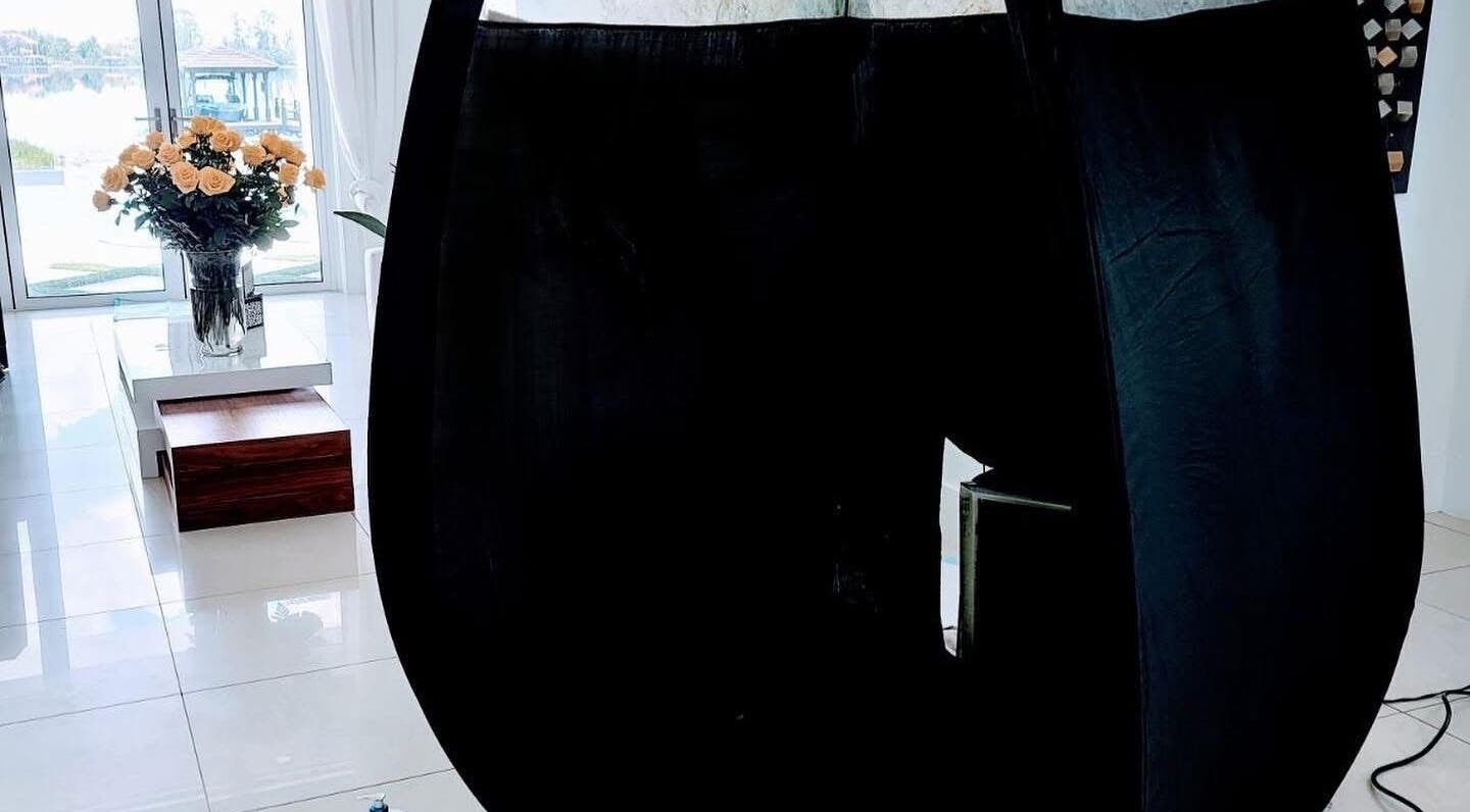 Elegant interior with flowers at Glow on the Go, Paisley, Scotland, GB offers tranquil beauty experience.