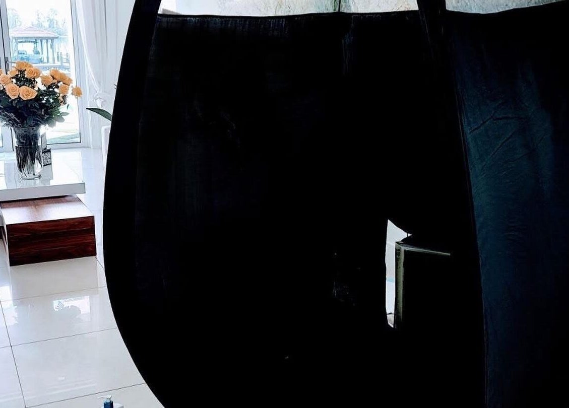 Modern salon interior at Glow on the Go in Paisley, Scotland, GB with bright lighting and floral decor.