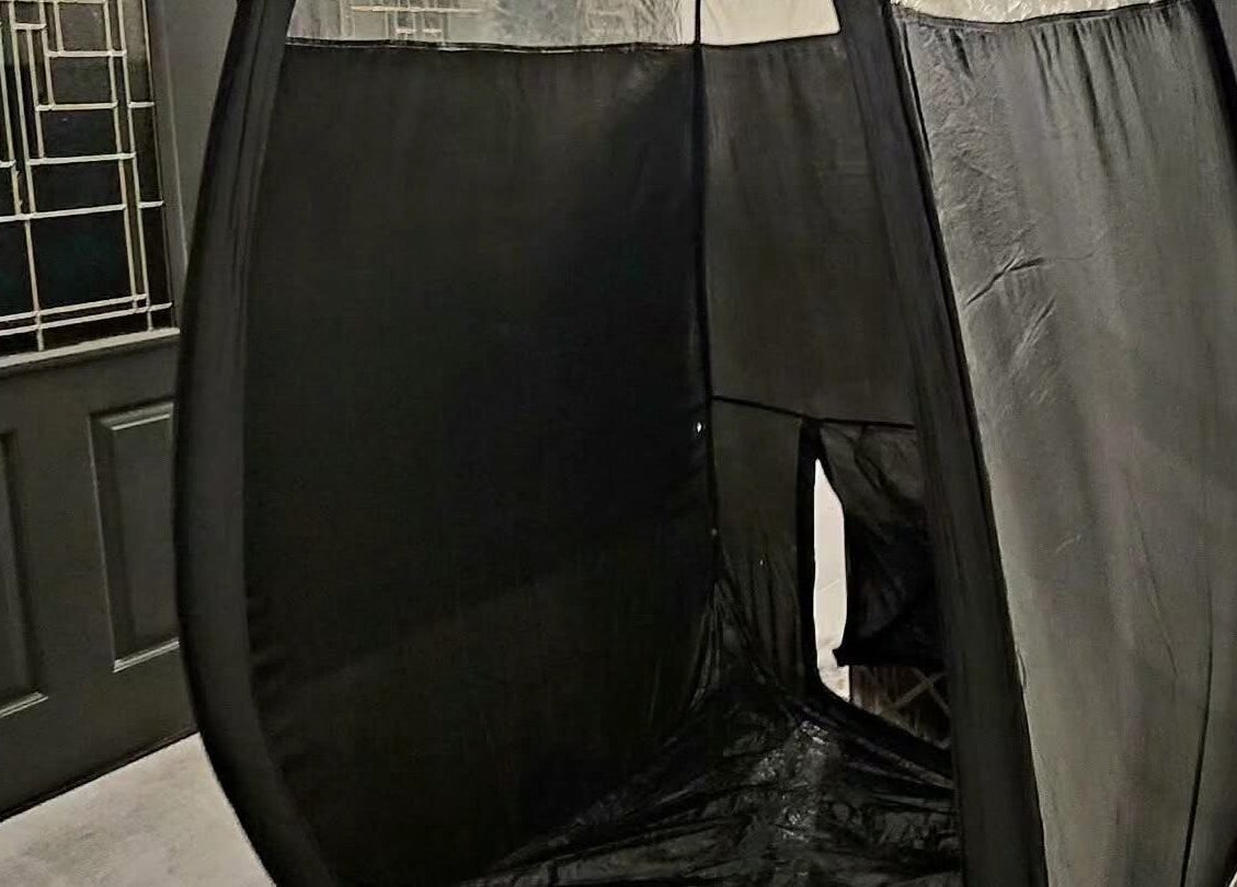 Modern tanning booth at Glow on the Go, Paisley, Scotland, GB offering premium sunless tanning services.