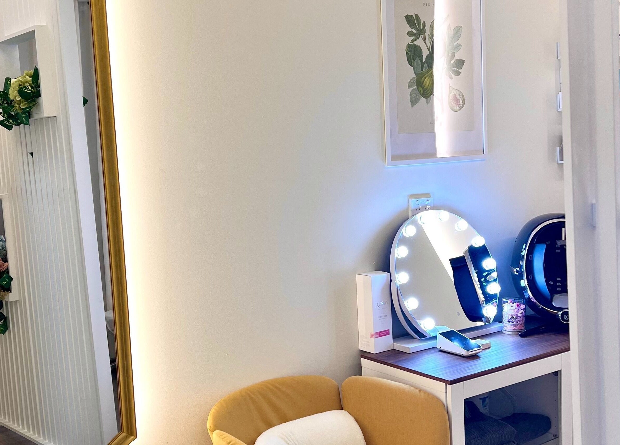 Elegant vanity area at Stayoung Clinic Auburn, New South Wales, AU, showcasing modern decor and lighting.