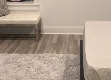 Modern room at CLEWIS IN CONSTRUCTION LLC, Queen, US featuring a plush rug and elegant seating.