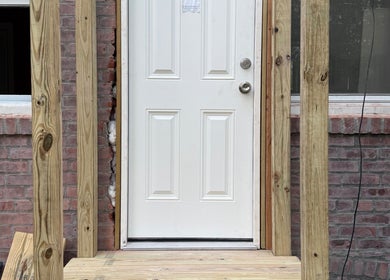 Wooden porch under construction by CLEWIS IN CONSTRUCTION LLC in Queen, US.