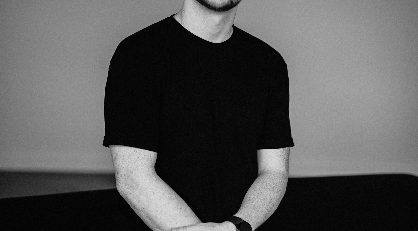 Stylish individual at Allen Everett Studio, Willoughby Hills, Ohio, US wearing a black shirt.