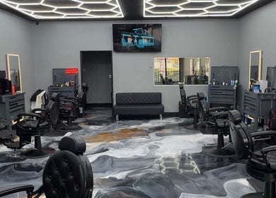 Modern interior of The Spot barbershop in Los Angeles, California, US, highlighting stylish design and seating.