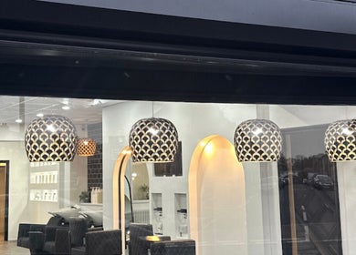 Elegant salon interior at LASH EM BEAUTY, AESTHETICS & PMU, Wallsend, England, GB featuring modern lighting.