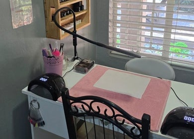 Nail station at Leoné Scheepers Beauty, Pretoria, Gauteng, ZA with tools and products neatly arranged.