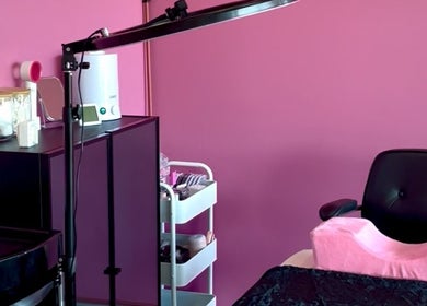 Modern pink beauty station at Chic Beauty Bar, Schofields, New South Wales, AU features elegant equipment.