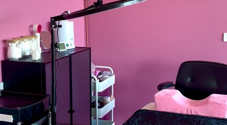 Modern pink beauty station at Chic Beauty Bar, Schofields, New South Wales, AU features elegant equipment.