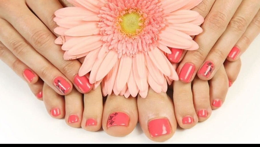 Bright pink nails and elegant designs at BellaZoe Nail Salon in Klerksdorp, ZA.
