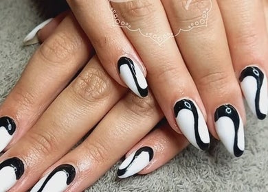 Elegant black and white nail art at BellaZoe Nail Salon, Klerksdorp, ZA.