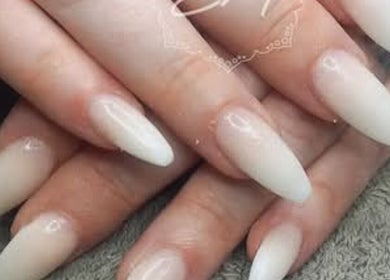 Sleek white acrylic nails at BellaZoe Nail Salon, Klerksdorp, ZA. Perfectly styled for elegant looks.