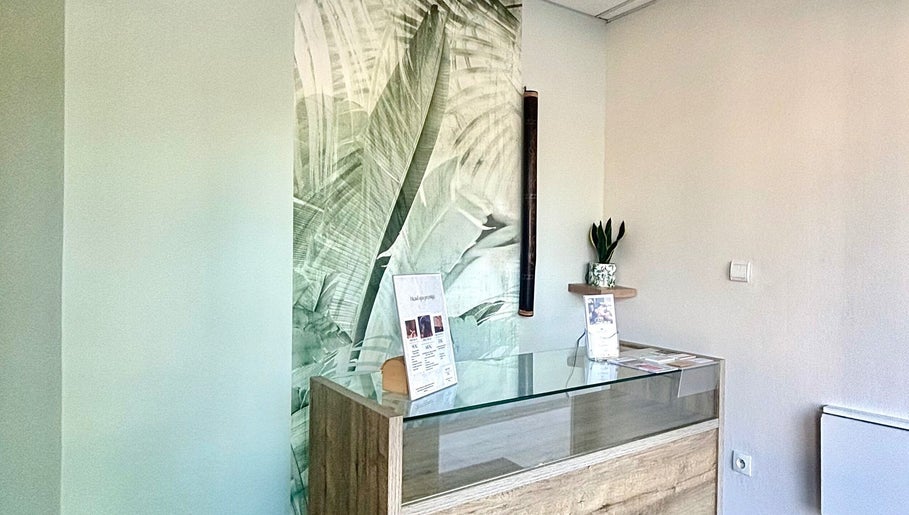 Réception apaisante de l'Institut c’zen à Artix, Nouvelle-aquitaine, FR, avec décor tropical.