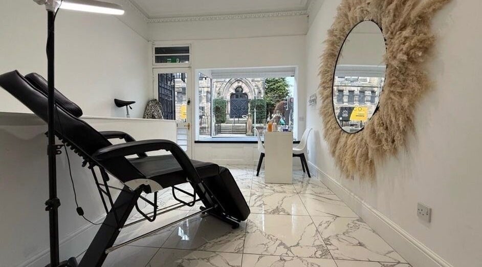 Modern treatment room at BeautyByCourtney, Edinburgh, Scotland, GB with elegant decor and stylish furnishings.