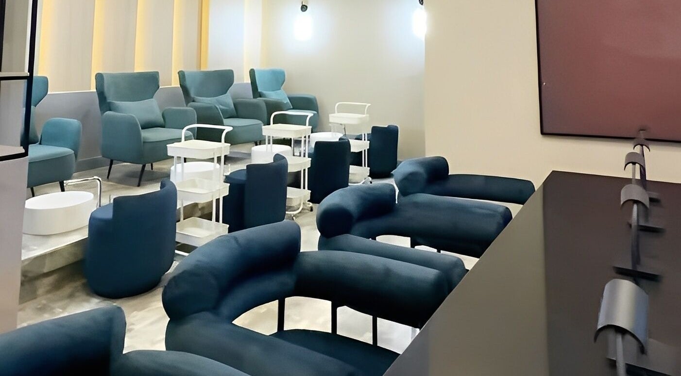 Luxurious seating at Aiona - The Art of Nails in Lagos, Lagos, NG, offering a relaxing atmosphere.