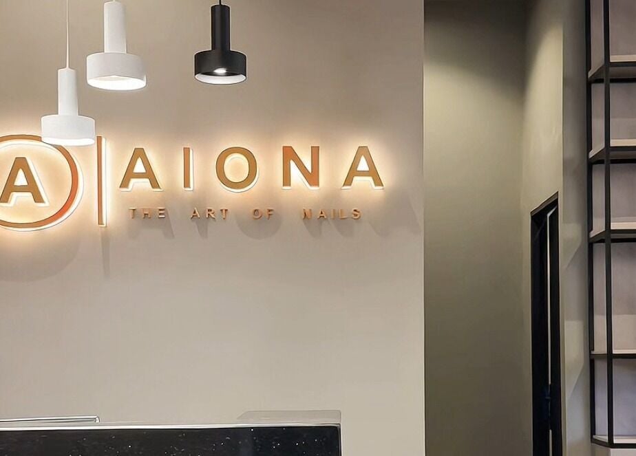 Aiona - The Art of Nails' elegant interior featuring chic pendant lights. Located in Lagos, Lagos, NG.