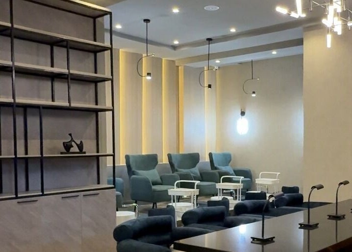 Sophisticated interior at Aiona - The Art of Nails, Lagos, Lagos, NG. Modern chairs and sleek lighting.