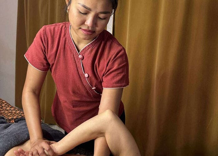 Therapist at Original Thai Massage in Brighton by Pear providing a relaxing massage in Brighton, GB.