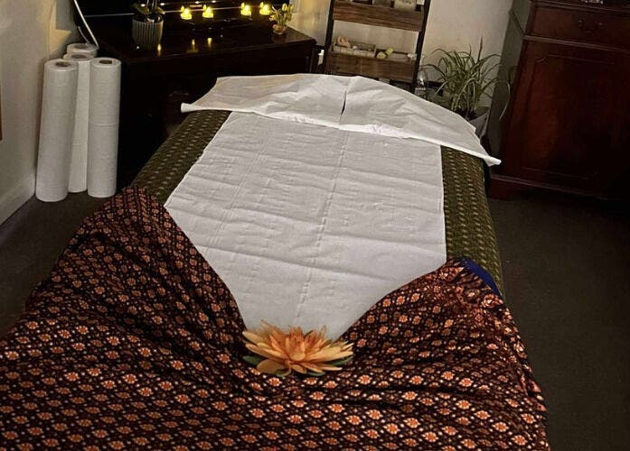 Peaceful massage table at Original Thai Massage in Brighton by Pear, Brighton, GB, with elegant decor.