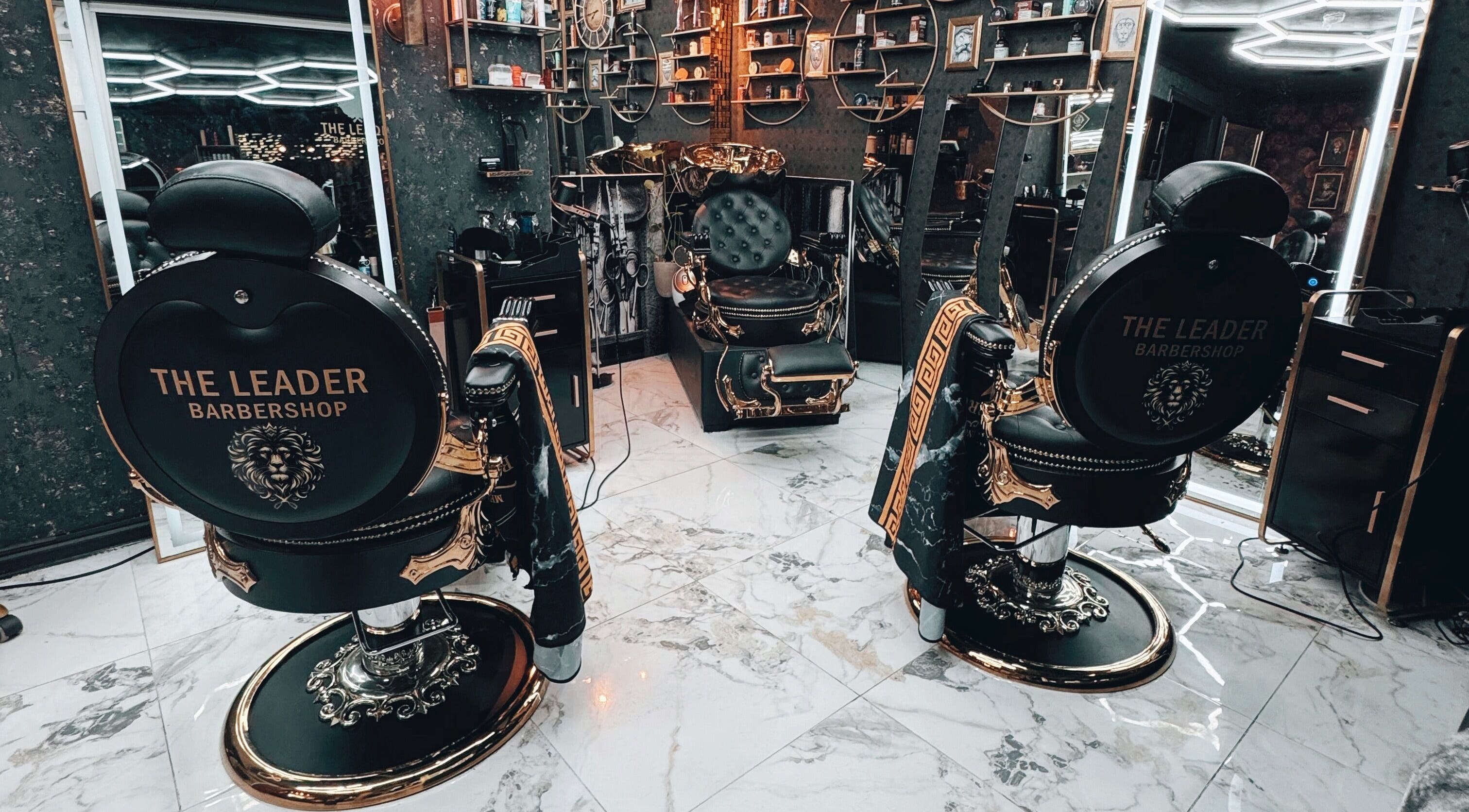 Elegant interior of The Leader Barbershop in Trondheim, Trøndelag, NO with stylish barber chairs.