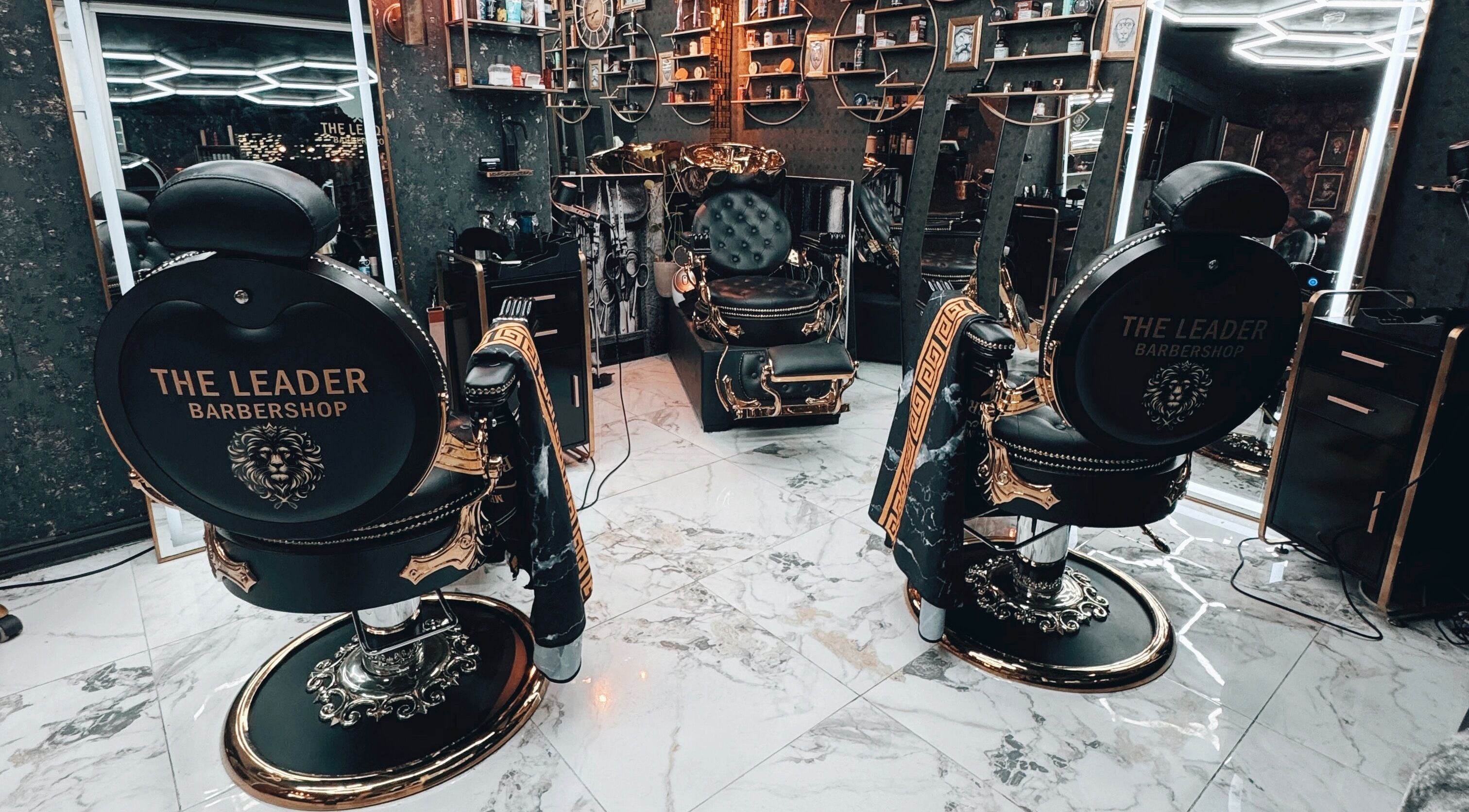 Elegant interior of The Leader Barbershop in Trondheim, Trøndelag, NO with stylish barber chairs.