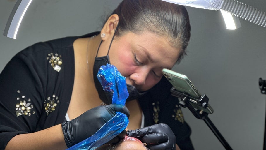 Professional beauty artist at Magicallybyzz, Petaling Jaya, Selangor, MY crafting precise eyebrow work.