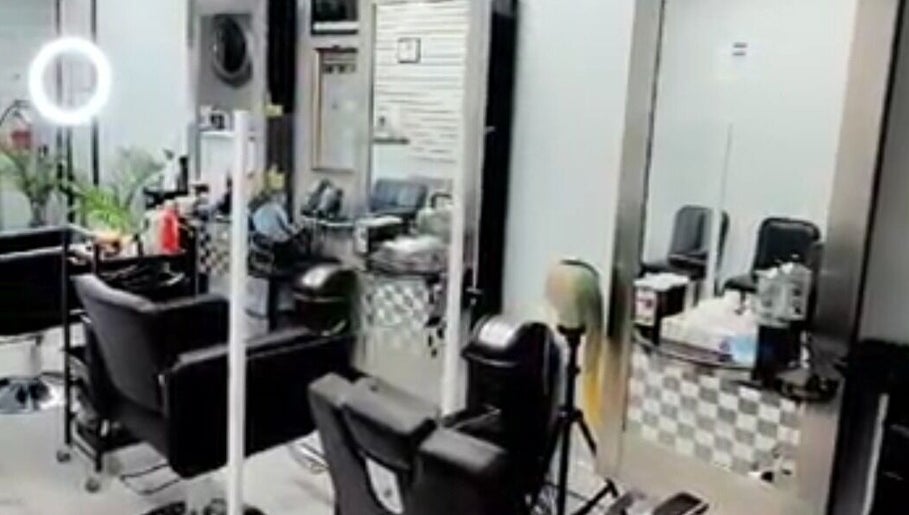 Sleeks Salon interior with stylish chairs and mirrors in Toronto, Ontario, CA.