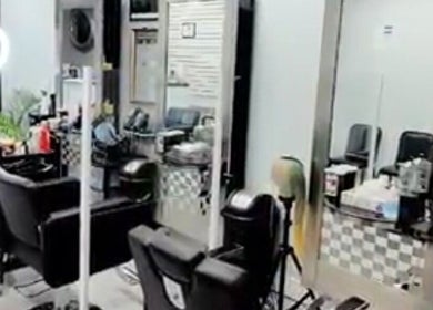 Sleeks Salon interior with stylish chairs and mirrors in Toronto, Ontario, CA.