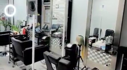 Sleeks Salon interior with stylish chairs and mirrors in Toronto, Ontario, CA.