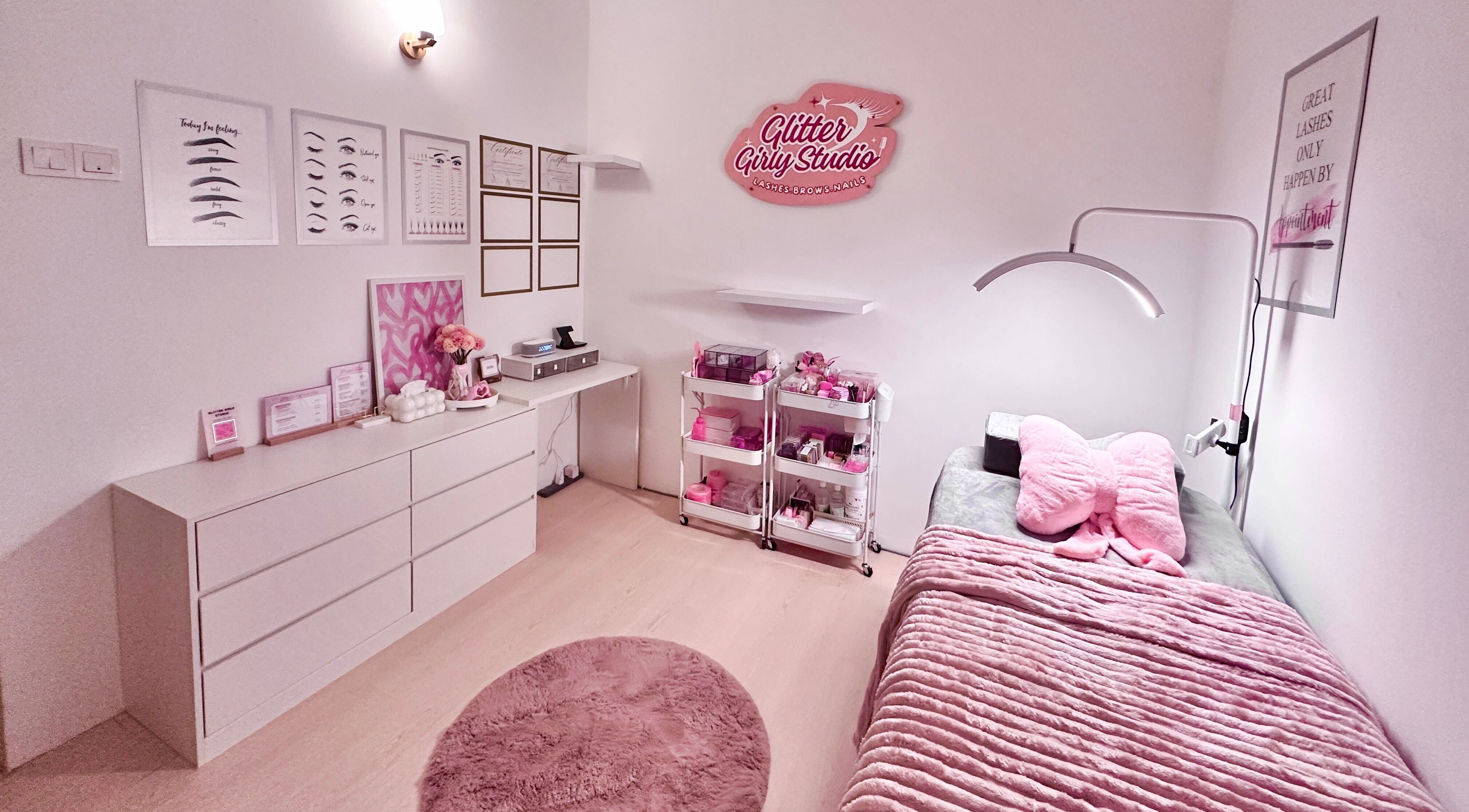 Cozy interior of Glitter Girly Studio in Puchong, Selangor, MY featuring pink decor and beauty treatment setup.