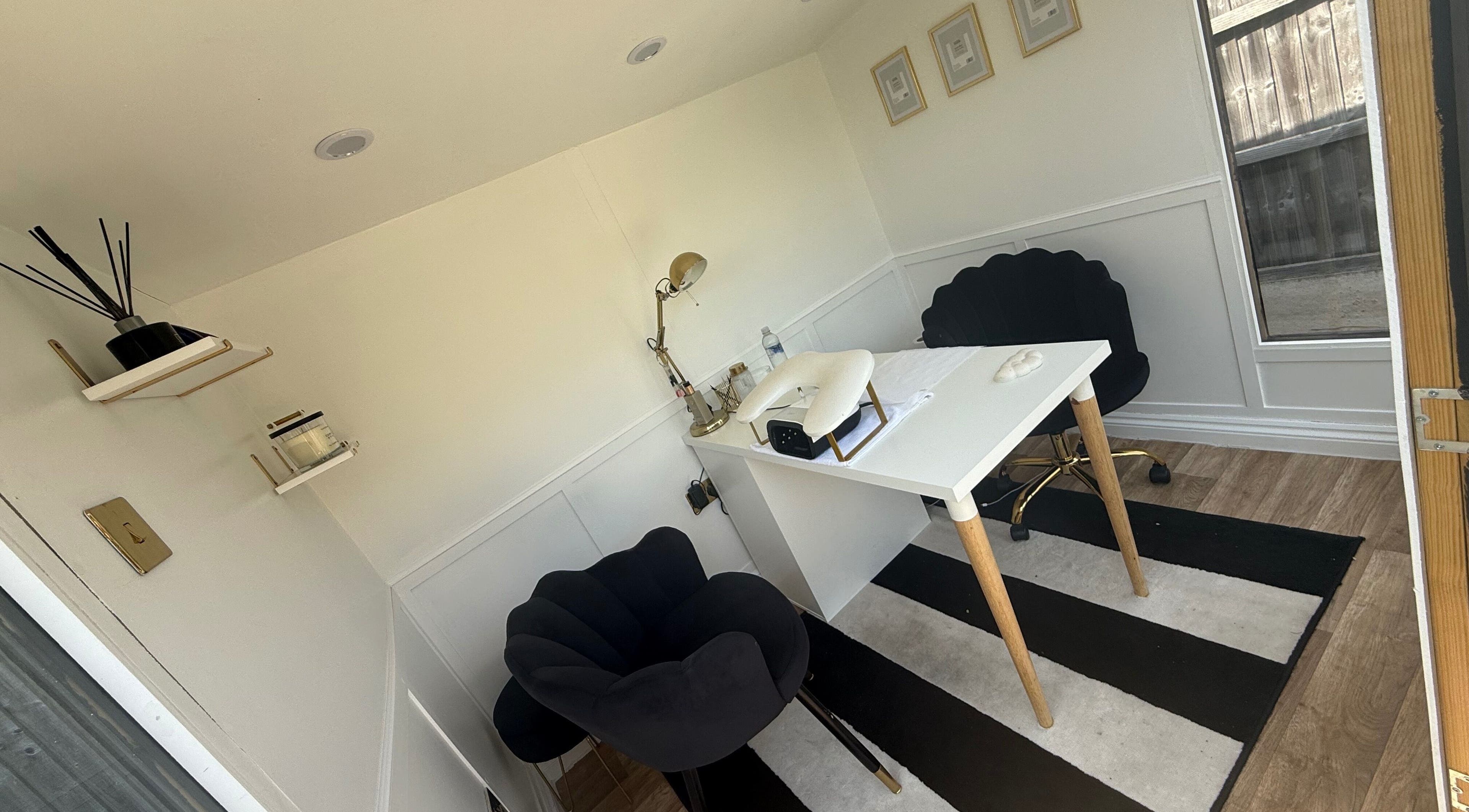 Elegant beauty studio at ByChlo, Morley, England, GB, featuring chic decor and a cozy workspace.