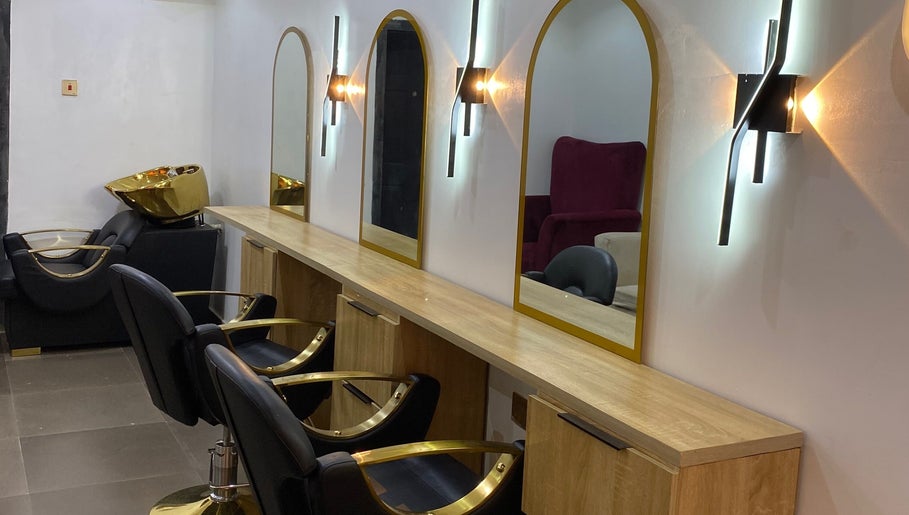 Elegant salon setup with chairs and mirrors at Glamor Nails and Beauty in Ikeja, Lagos, NG.